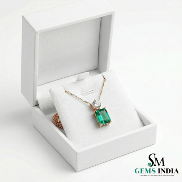 Emerald Cut Green Emerald Pendant with Round Diamond Accent