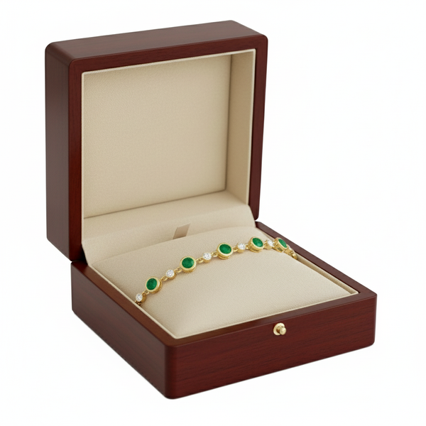 Doppelter Smaragd-Ring in offenem Design aus 14 Karat Gold – Band mit quadratisch und rund geschliffenen grünen Edelsteinen