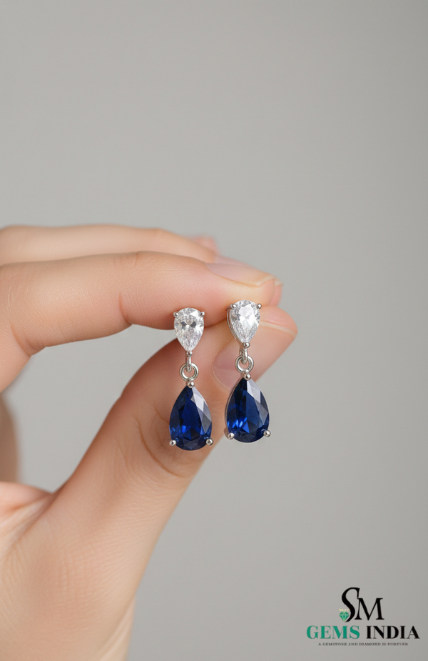 Pear Blue Moissanite Drop Earrings with White Moissanite Accents