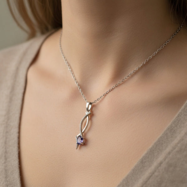 Natural Oval Tanzanite Twisted Diamond Pendant