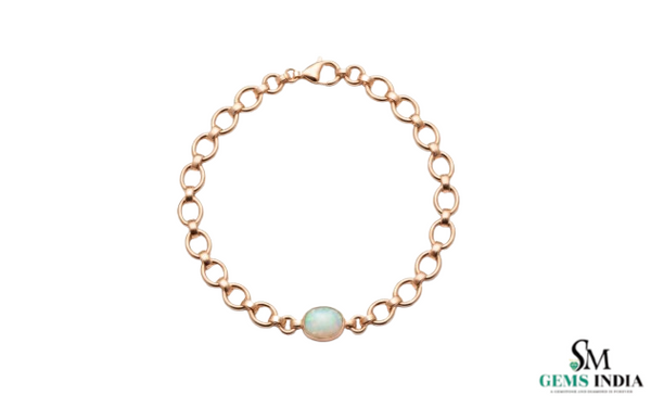 Doppelter Smaragd-Ring in offenem Design aus 14 Karat Gold – Band mit quadratisch und rund geschliffenen grünen Edelsteinen