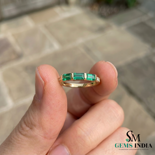 Elegant Three Stone Baguette Emerald Ring in 14k Gold