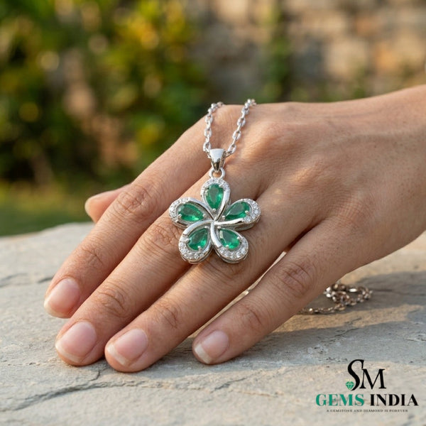 Pear Cut Emerald Flower Pendant with Diamond Halo in 18k Gold
