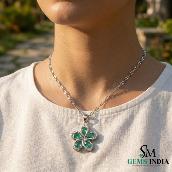 Pear Cut Emerald Flower Pendant with Diamond Halo in 18k Gold