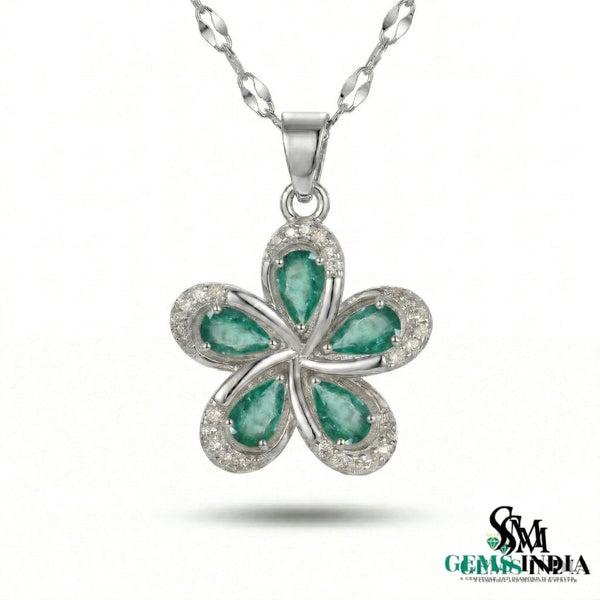 Pear Cut Emerald Flower Pendant with Diamond Halo in 18k Gold