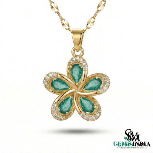 Pear Cut Emerald Flower Pendant with Diamond Halo in 18k Gold