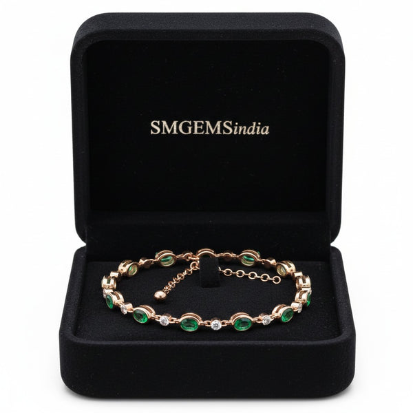 Doppelter Smaragd-Ring in offenem Design aus 14 Karat Gold – Band mit quadratisch und rund geschliffenen grünen Edelsteinen