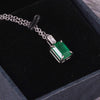 Elegant 1.03 carat Emerald cut Natural Emerald and Baguette Diamond Drop Pendant