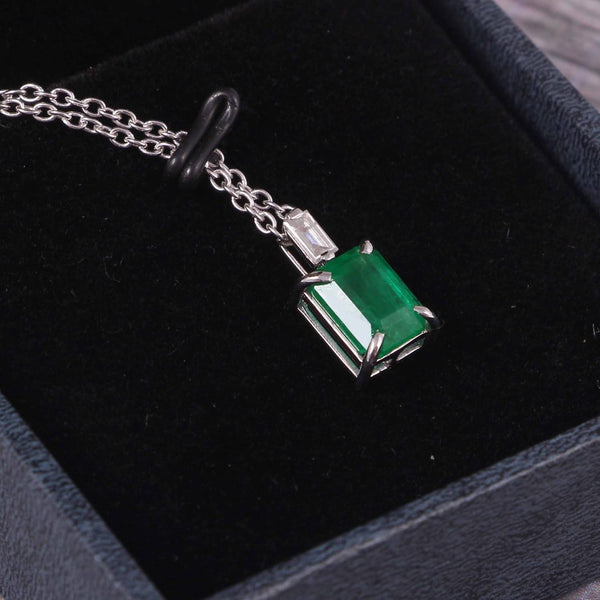 Elegant 1.03 carat Emerald cut Natural Emerald and Baguette Diamond Drop Pendant