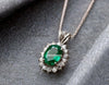 Vintage style 2.30 carat Oval shape Natural Emerald and Diamond Halo Pendant Necklace in 14K gold