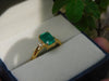 2.50 carat Elegant Emerald Cut Emerald Ring with Diamond Accents and 14k Gold Flat Band