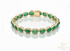 Tennisarmband aus Natur-Smaragden im Ovalschliff und Diamanten in Gold | Tennisarmband aus Natur-Smaragden und Diamanten in Gold | Tennisarmband mit großen Smaragden im Ovalschliff