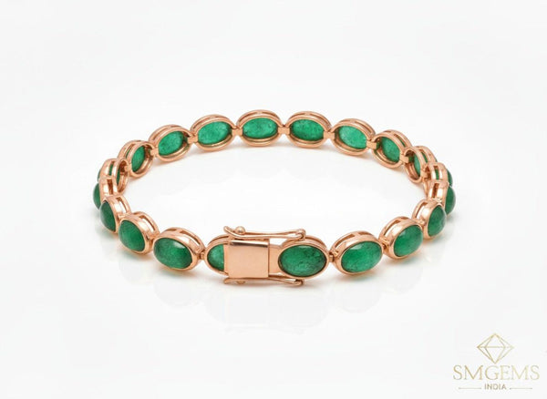 Tennisarmband aus Natur-Smaragden im Ovalschliff und Diamanten in Gold | Tennisarmband aus Natur-Smaragden und Diamanten in Gold | Tennisarmband mit großen Smaragden im Ovalschliff