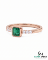 Octagon Cut Emerald Bezel Set Ring with Diamond Accent Band