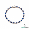 Pear-Cut Blue Sapphire Tennis Bracelet with Diamond Accents - September Birthstone Gift