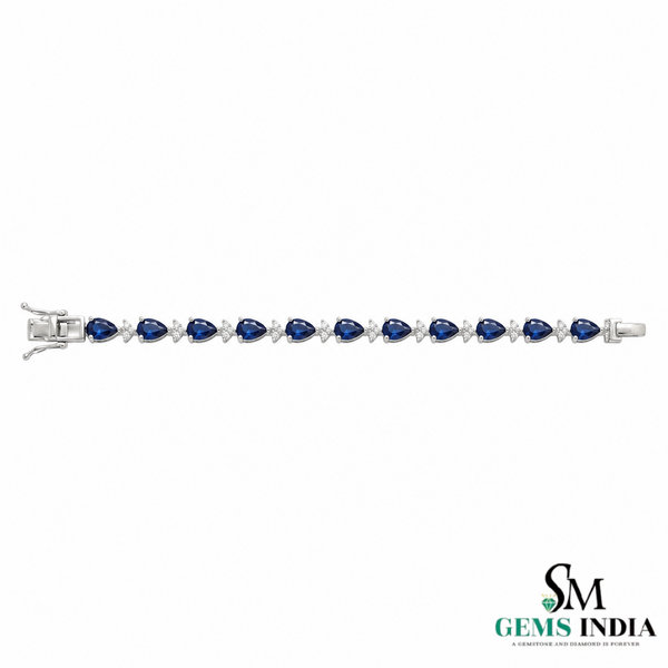 Pear-Cut Blue Sapphire Tennis Bracelet with Diamond Accents - September Birthstone Gift