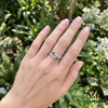 Elegant Oval Emerald and Diamond Bypass Ring - Green Gemstone Jewelry