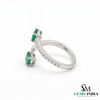 Elegant Oval Emerald and Diamond Bypass Ring - Green Gemstone Jewelry