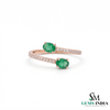 Elegant Oval Emerald and Diamond Bypass Ring - Green Gemstone Jewelry