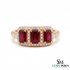 Rose gold ring with three red gemstones and diamonds on a white background, branded 'SM Gems India'.