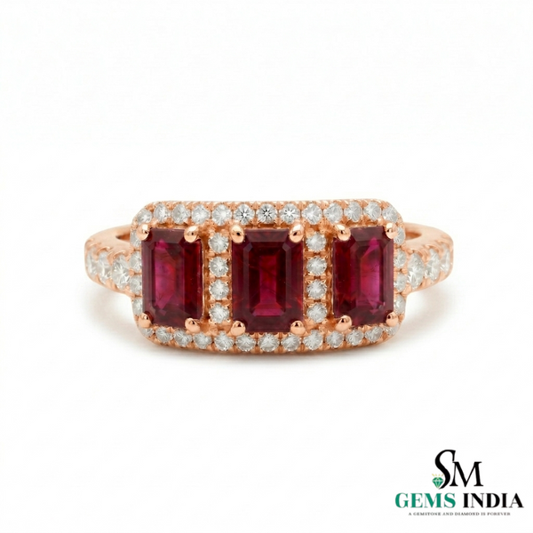 Rose gold ring with three red gemstones and diamonds on a white background, branded 'SM Gems India'.