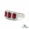 Ring with red gemstones and diamond accents on a white background, branded 'SM Gems India'.
