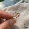 Elegant cushion-cut peach gemstone ring with diamond halo in rose gold setting by SM Gems India