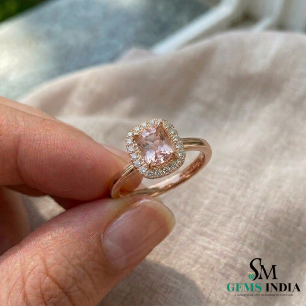 Elegant cushion-cut peach gemstone ring with diamond halo in rose gold setting by SM Gems India
