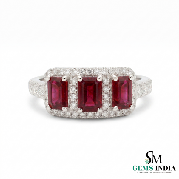 Ring with three rectangular red gemstones and diamond-studded band on a white background, branded 'SM Gems India'.