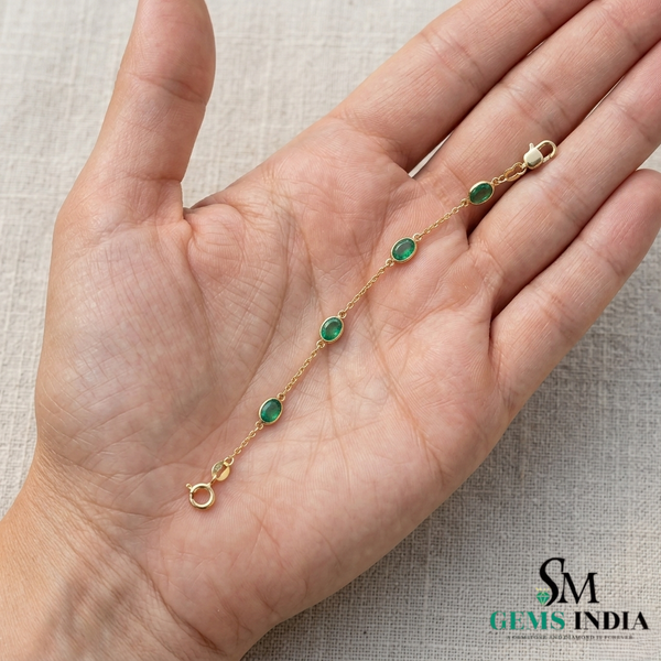 Tennisarmband aus Natur-Smaragden im Ovalschliff und Diamanten in Gold | Tennisarmband aus Natur-Smaragden und Diamanten in Gold | Tennisarmband mit großen Smaragden im Ovalschliff