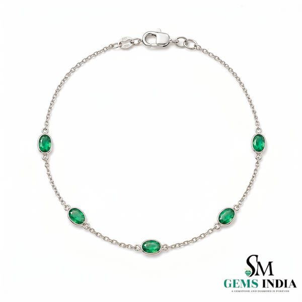 Tennisarmband aus Natur-Smaragden im Ovalschliff und Diamanten in Gold | Tennisarmband aus Natur-Smaragden und Diamanten in Gold | Tennisarmband mit großen Smaragden im Ovalschliff