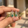 Oval Emerald Stud Earrings With Diamond Halo & Floral Design – Elegant Fine Jewelry