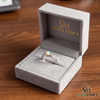 Doppelter Smaragd-Ring in offenem Design aus 14 Karat Gold – Band mit quadratisch und rund geschliffenen grünen Edelsteinen